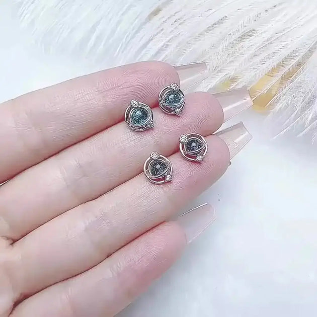 New sterling silver planet earrings european and american light luxury Nexellus